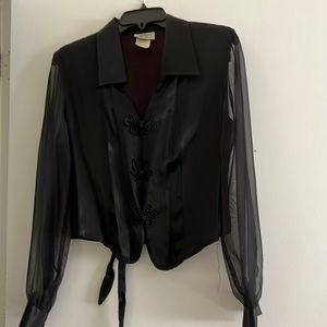 Black sheer sleeves crop shirt looks great dressed up or with jeans